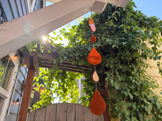 Orange glitter sundrop suncatcher / mobile