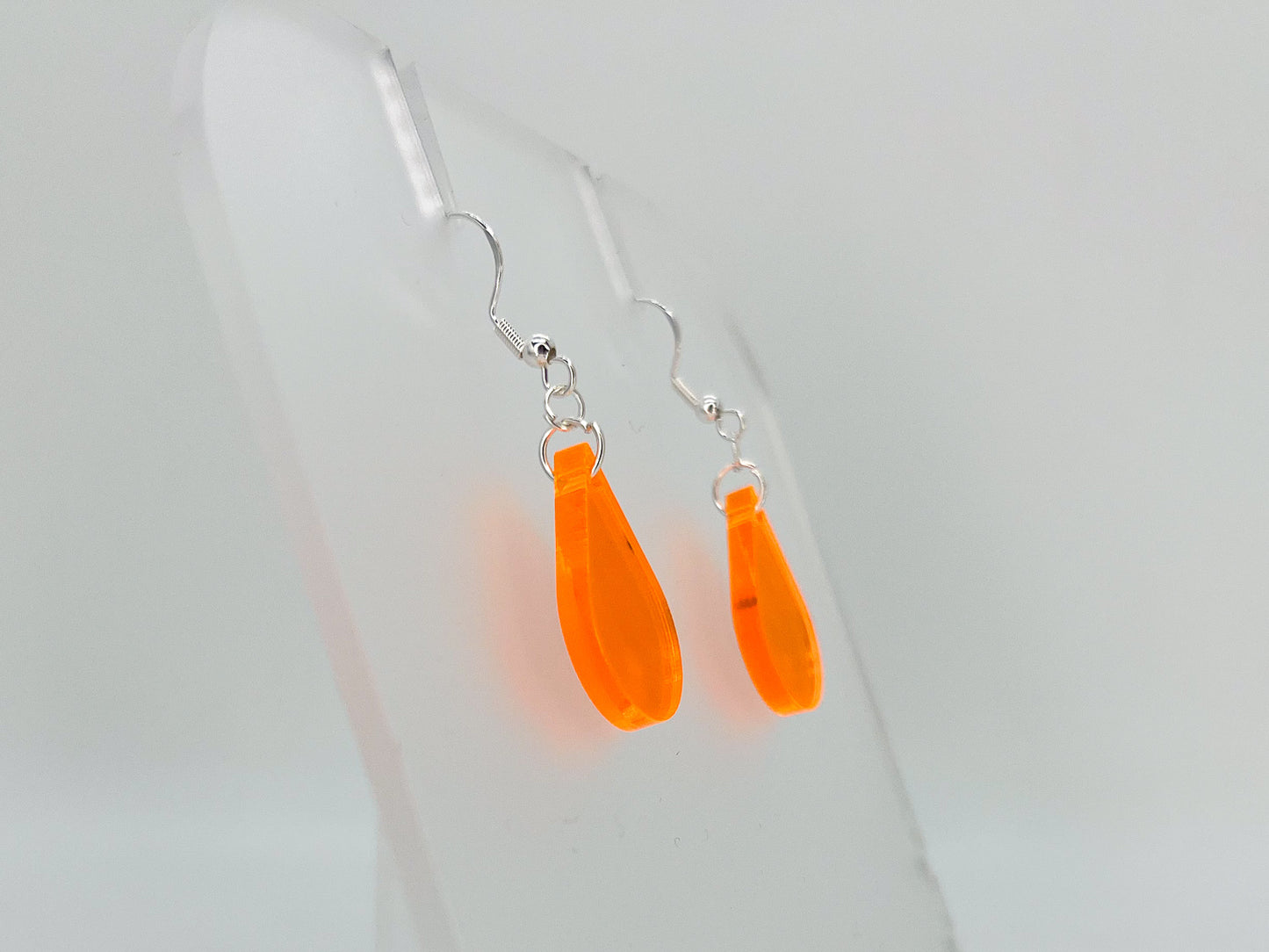 Fluorescent orange single sundrop hook dangle earrings