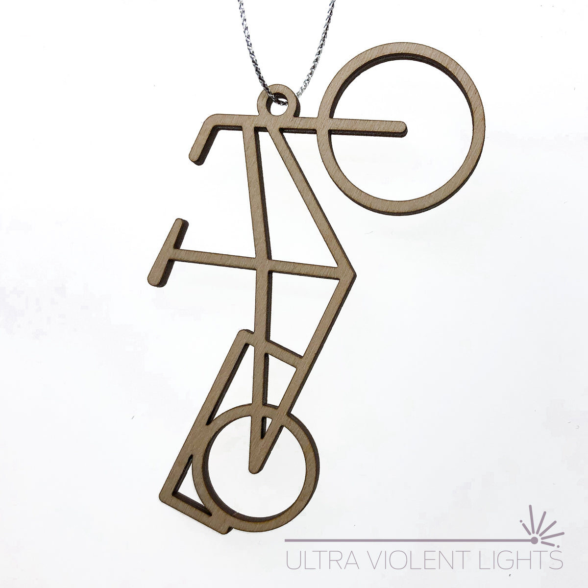 Wooden longtail bicycle ornament on white