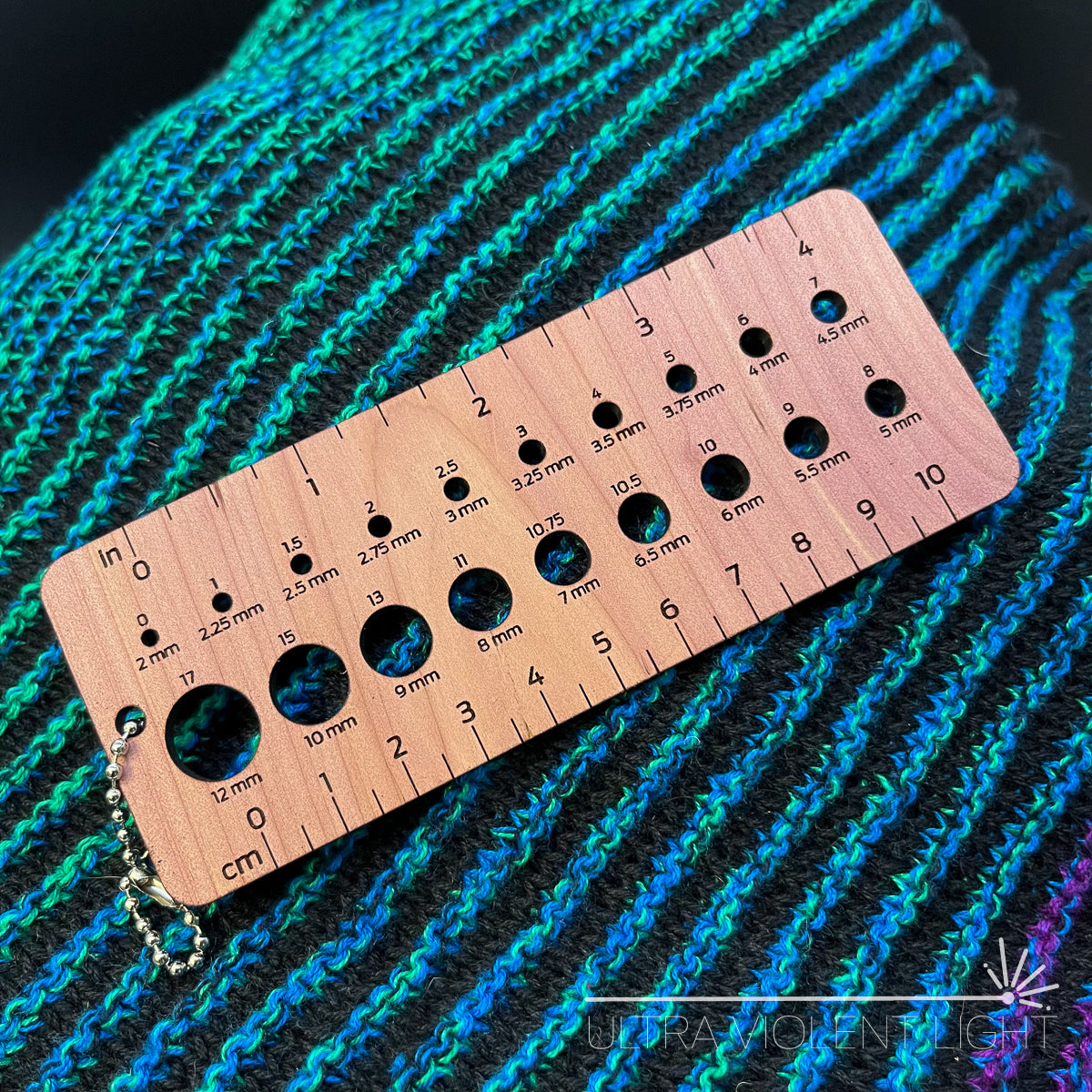 Ruler and knitting needle sizer