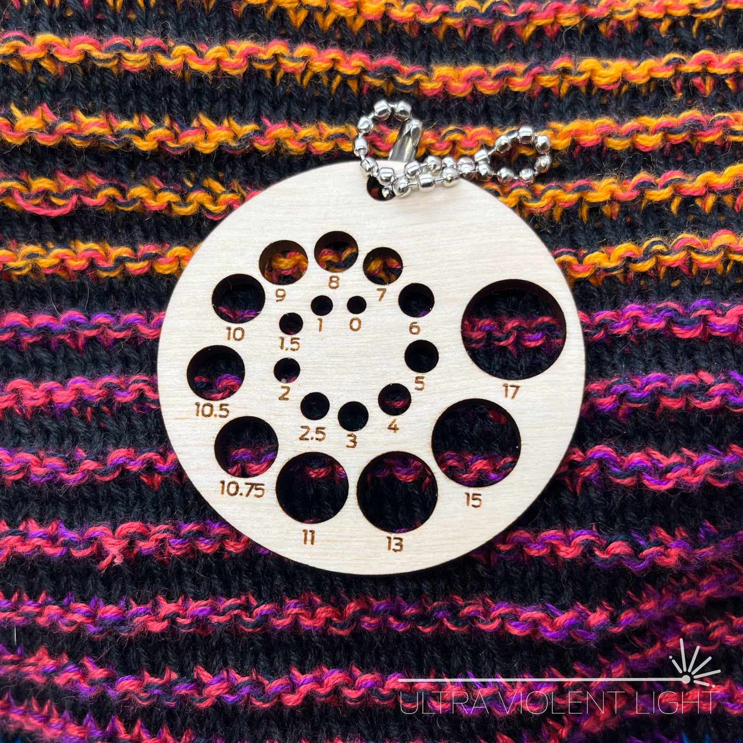 Spiral knitting needle sizer