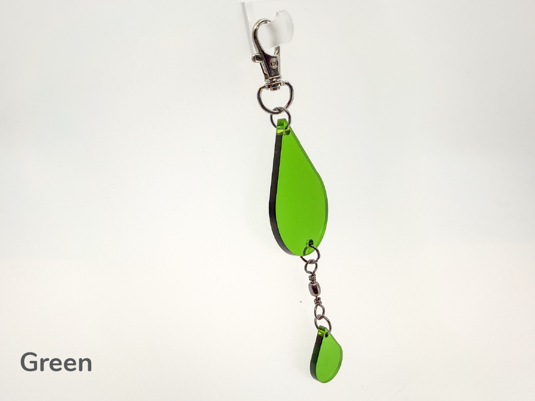 Green teardrop-shaped small sun catcher / keychain on a white background