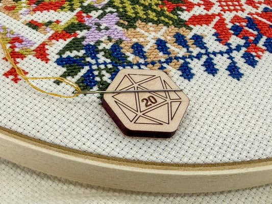 D20 needle minder