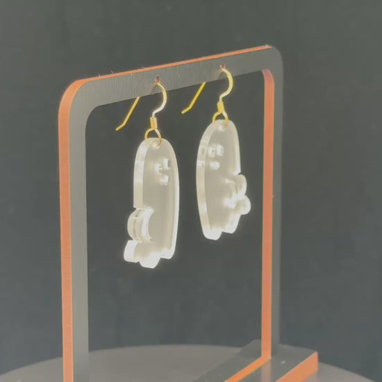 Ghost BOOty earrings with gold-colored hook findings on a wooden display.