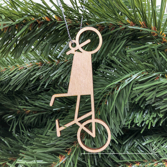 Wooden box bicycle ornament on greenery