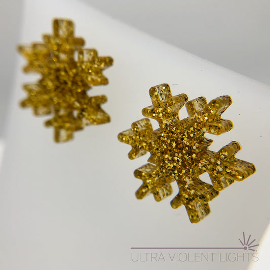 Sparkly gold snowflake stud earrings