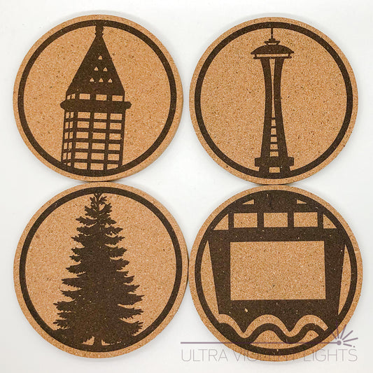 Coaster faces showing Seattle landmarks